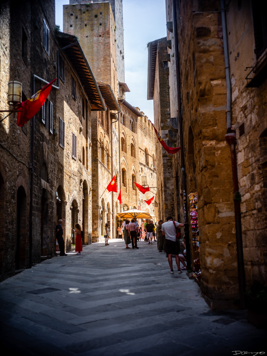 Photos from a trip through Italy in Summer of 2023. Locations include Rome, Florence, Tuscany, Castello di Bossi in Chianti, Siena, San Gimignano, Sirmione on Lake Garda, Bologna, Gudon, Italian Dolomites, Seceda, Cadini di Misurina, and Venice.